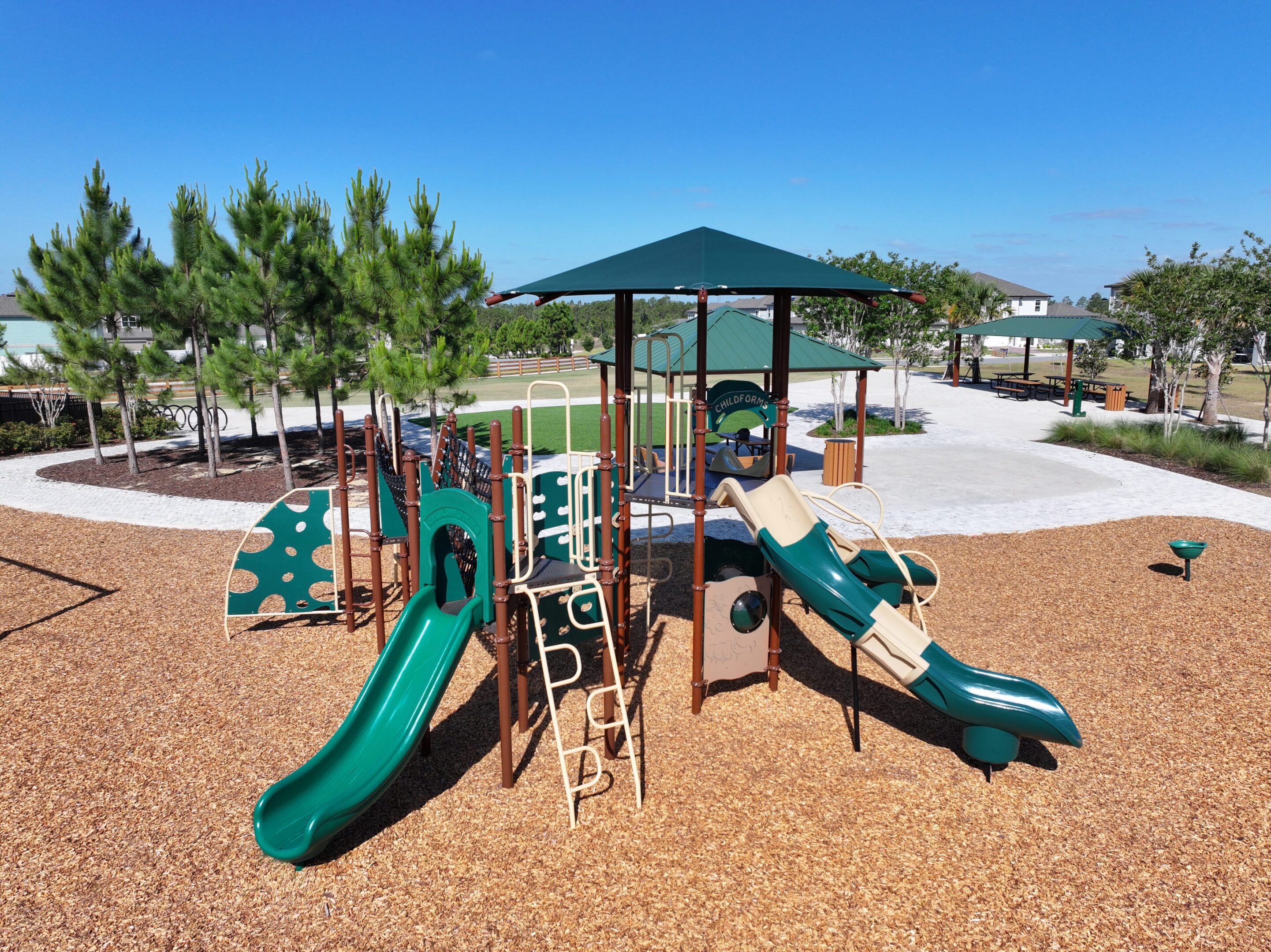Playground with slides and climbing structures