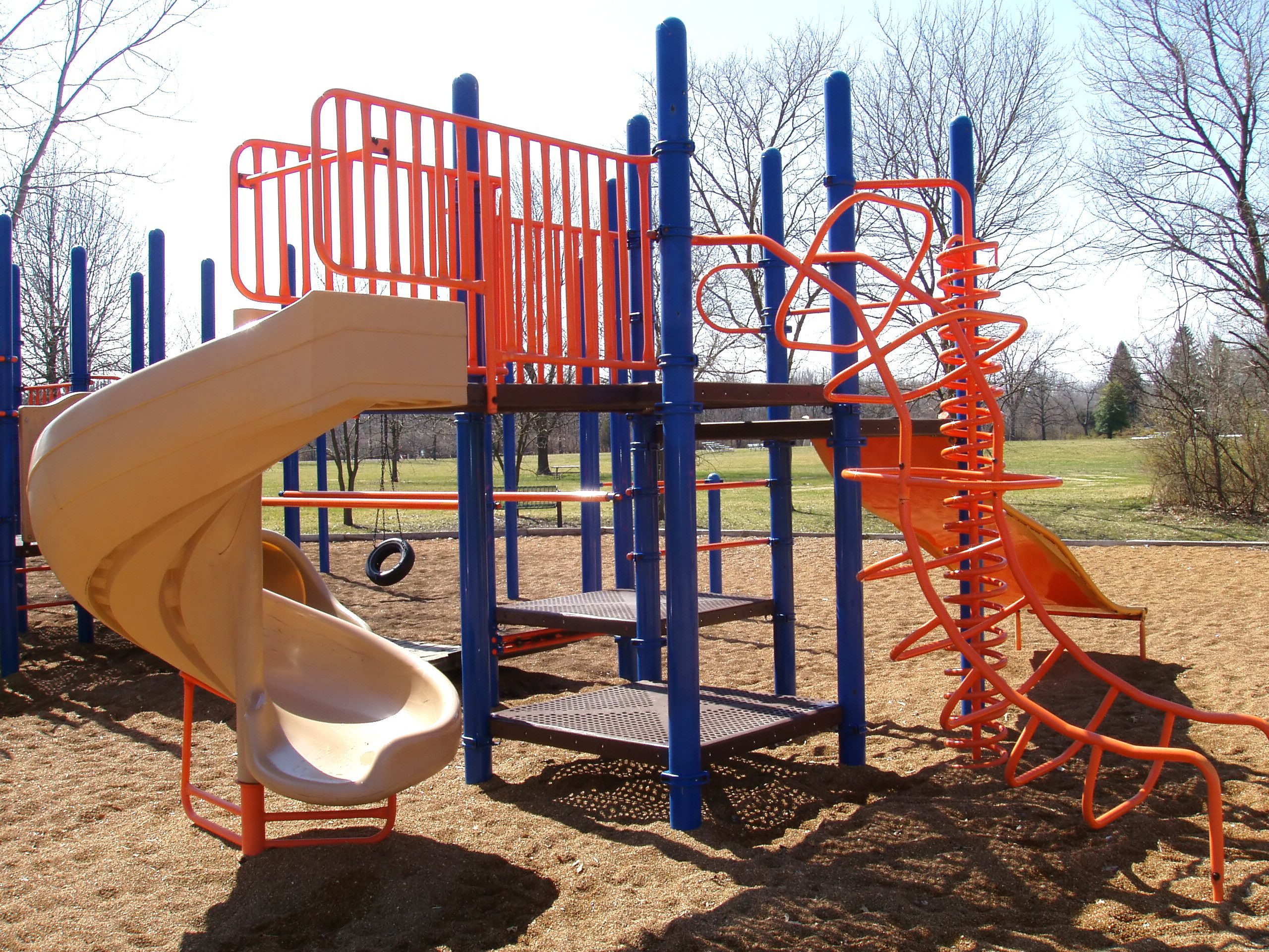 Playground with slide and climbing structure