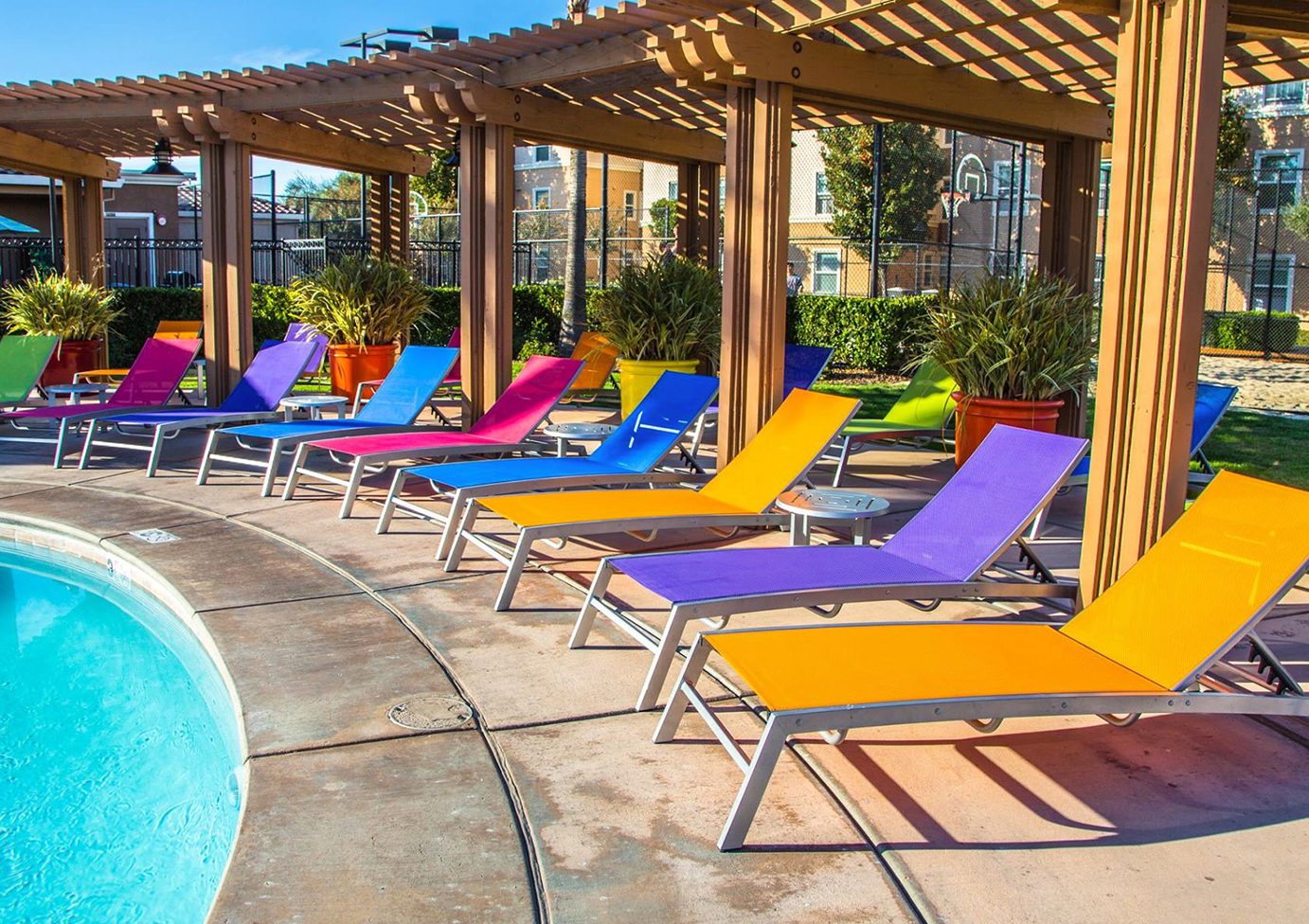 Colorful lounge chairs by the pool