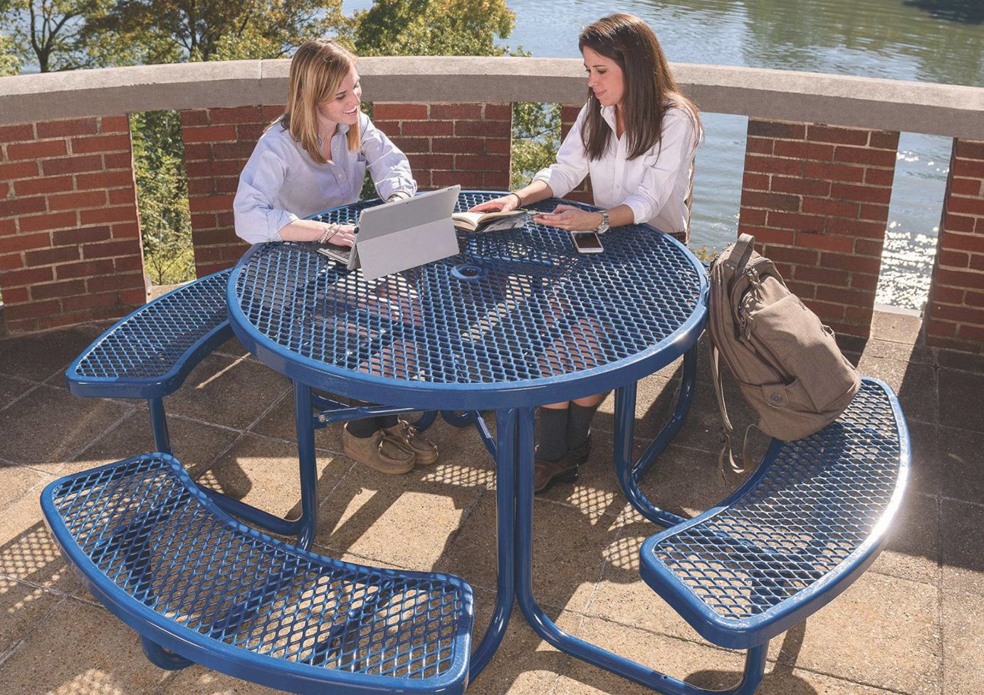 Outdoor study session by the water