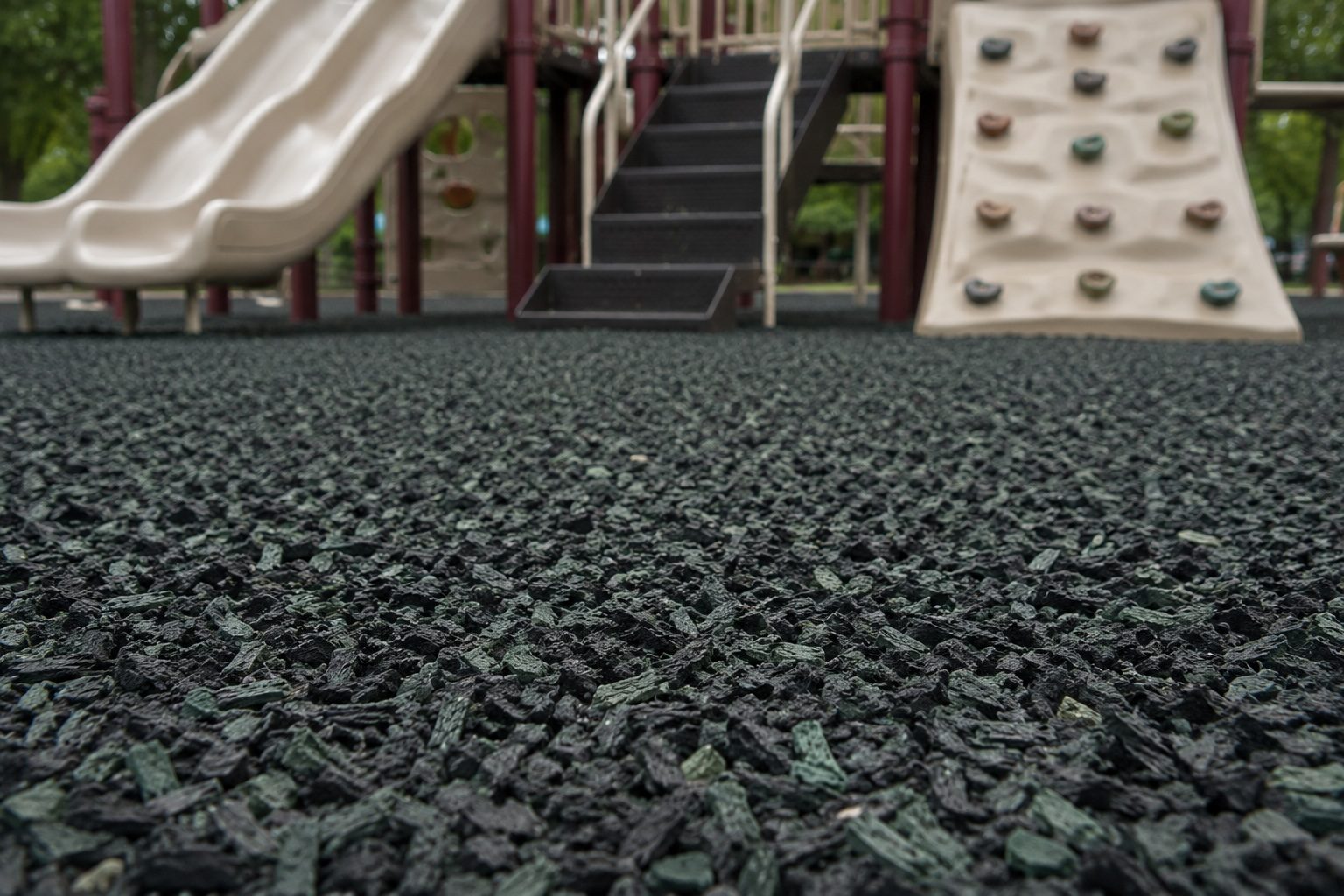 Rubber playground surface and equipment