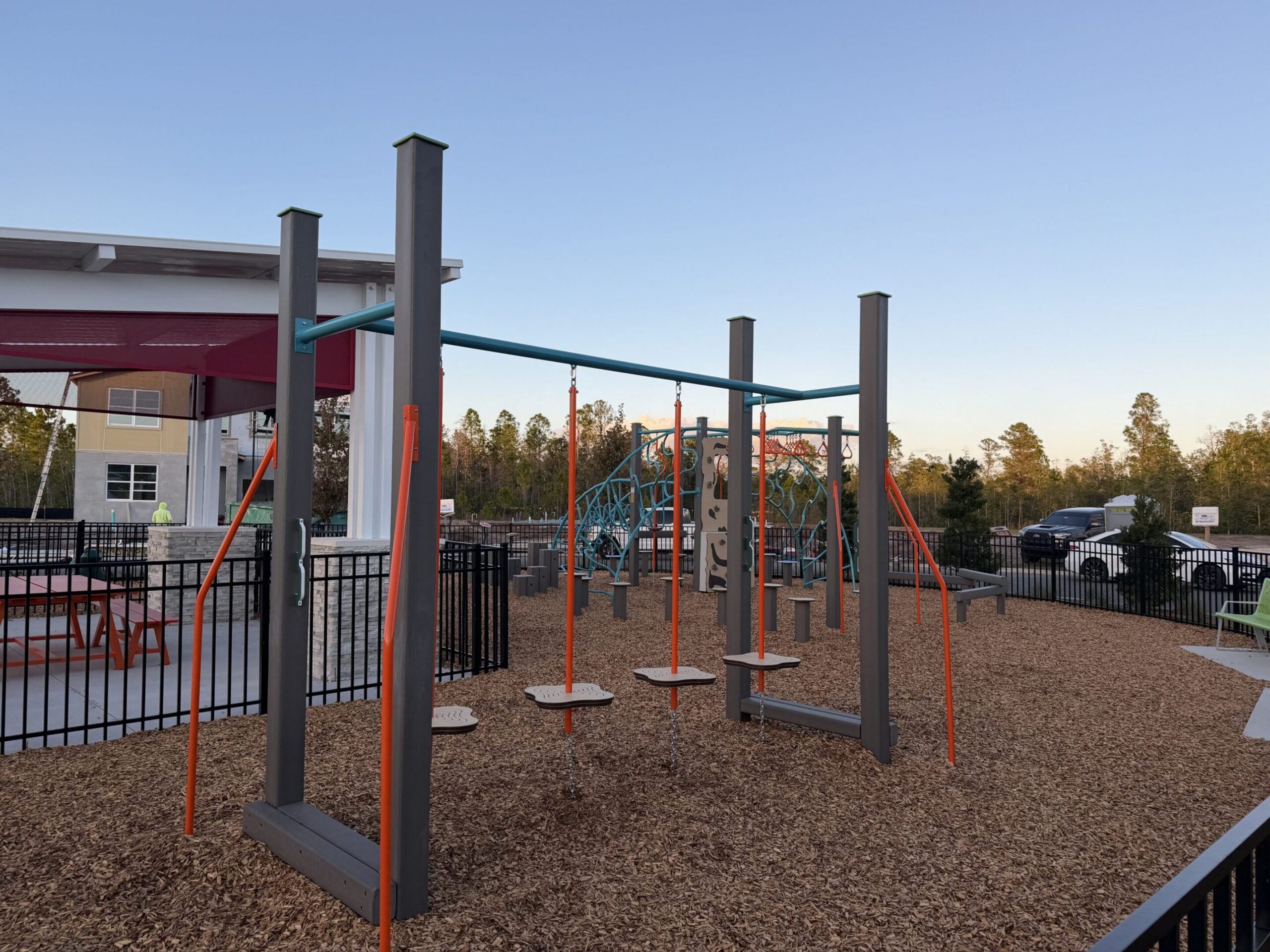 Playground with climbing equipment and slides