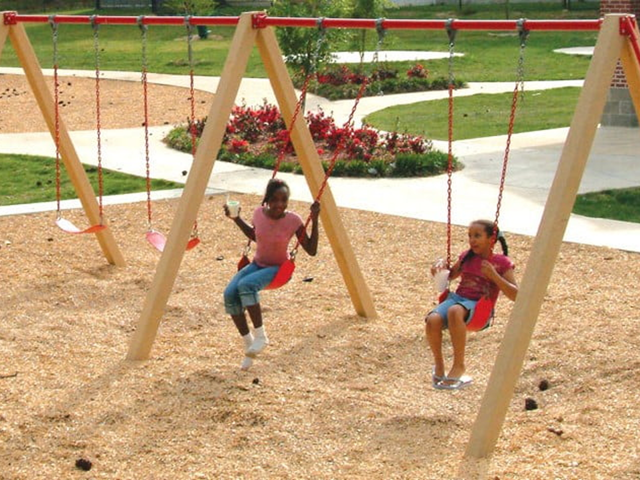 Children swinging at a playground