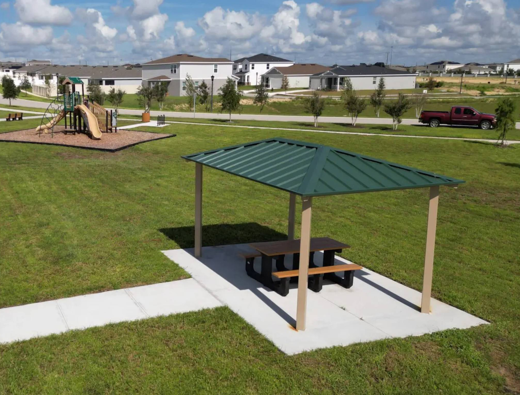 Suburban park with playground and pavilion