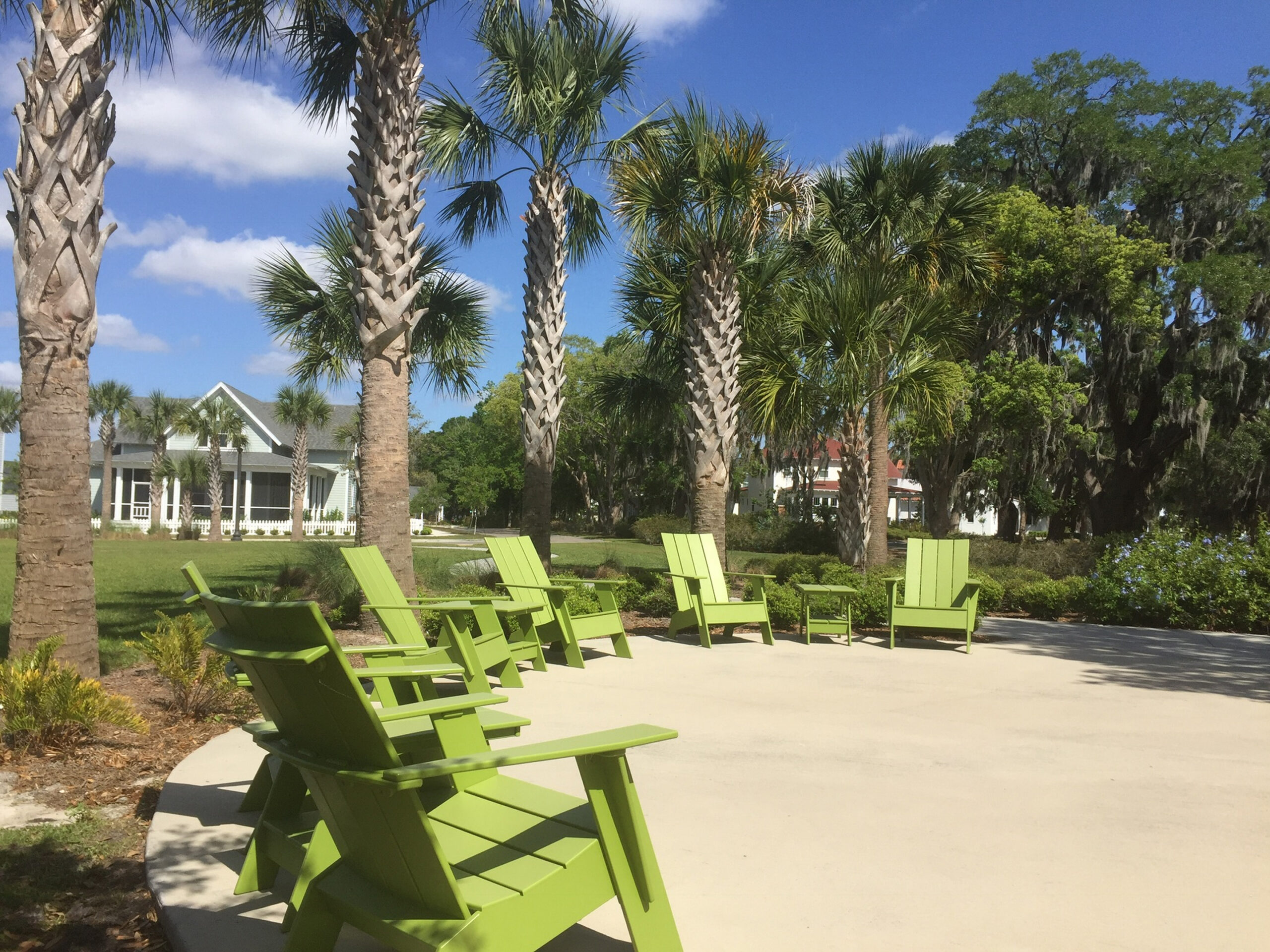 Patio chairs in sunny garden setting