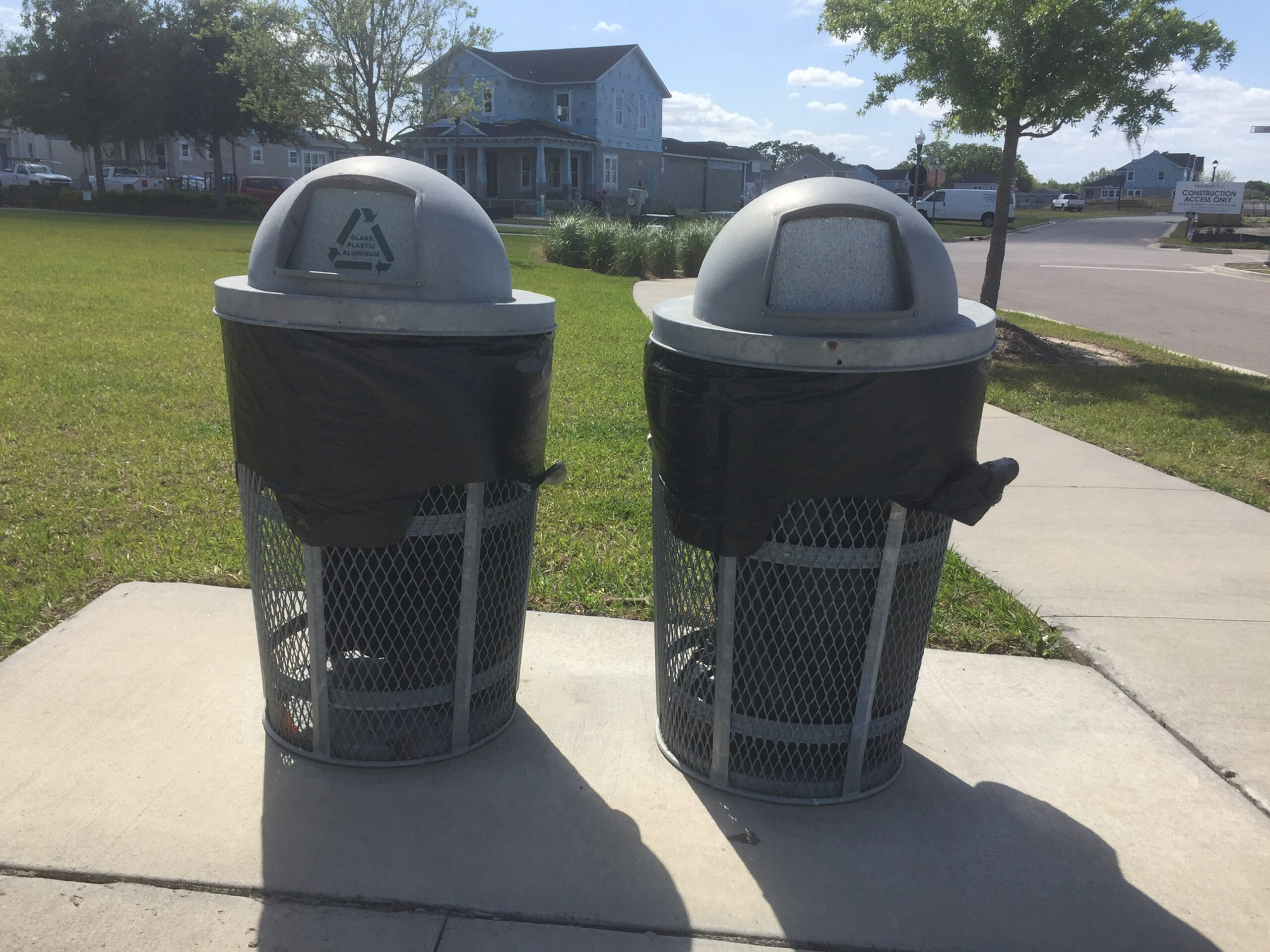 Metal garbage cans with lids