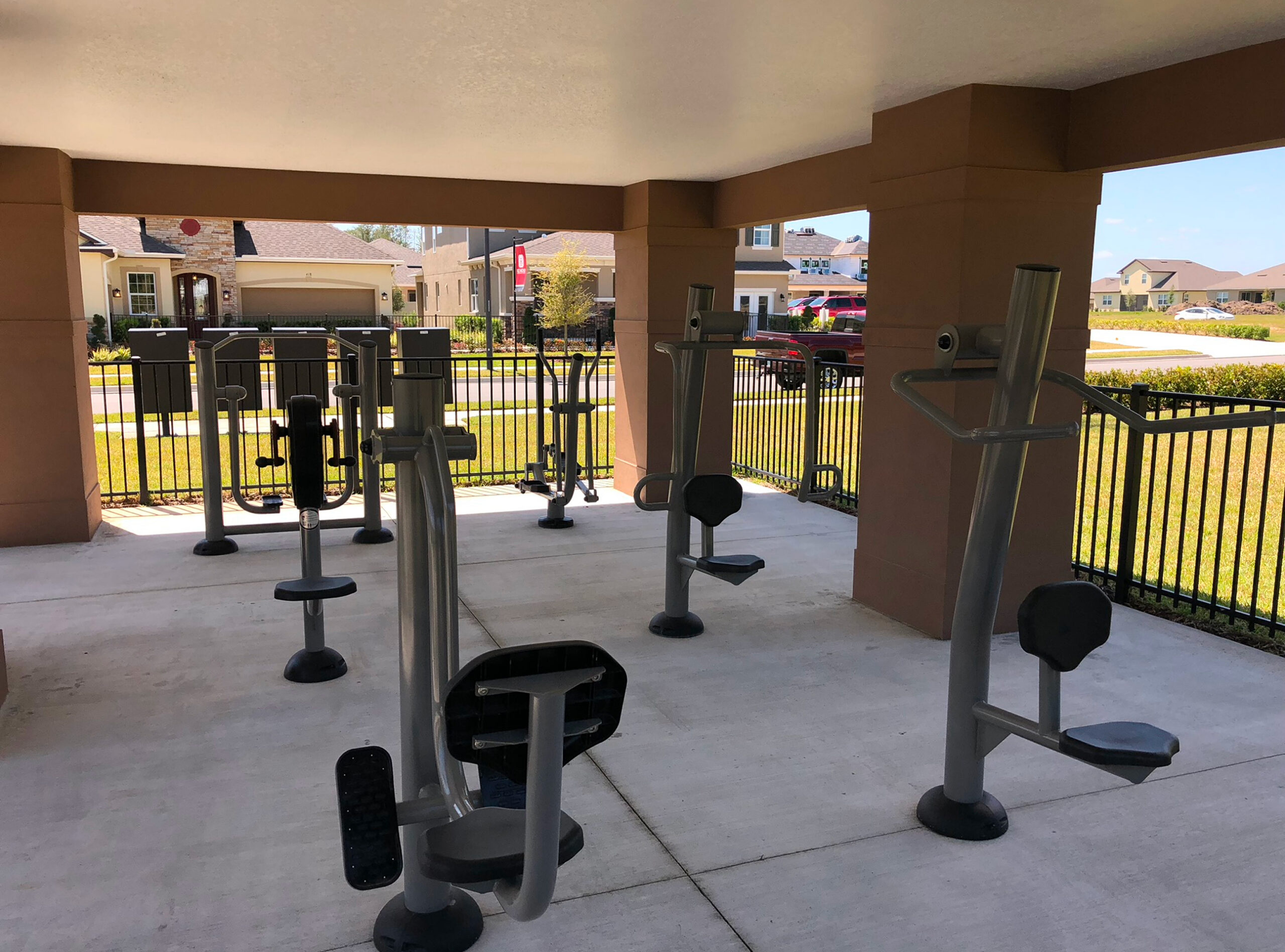 Covered fitness area with workout machines