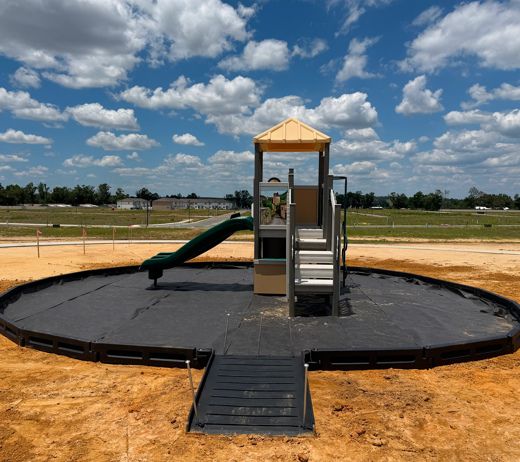 Slide and tower under blue sky
