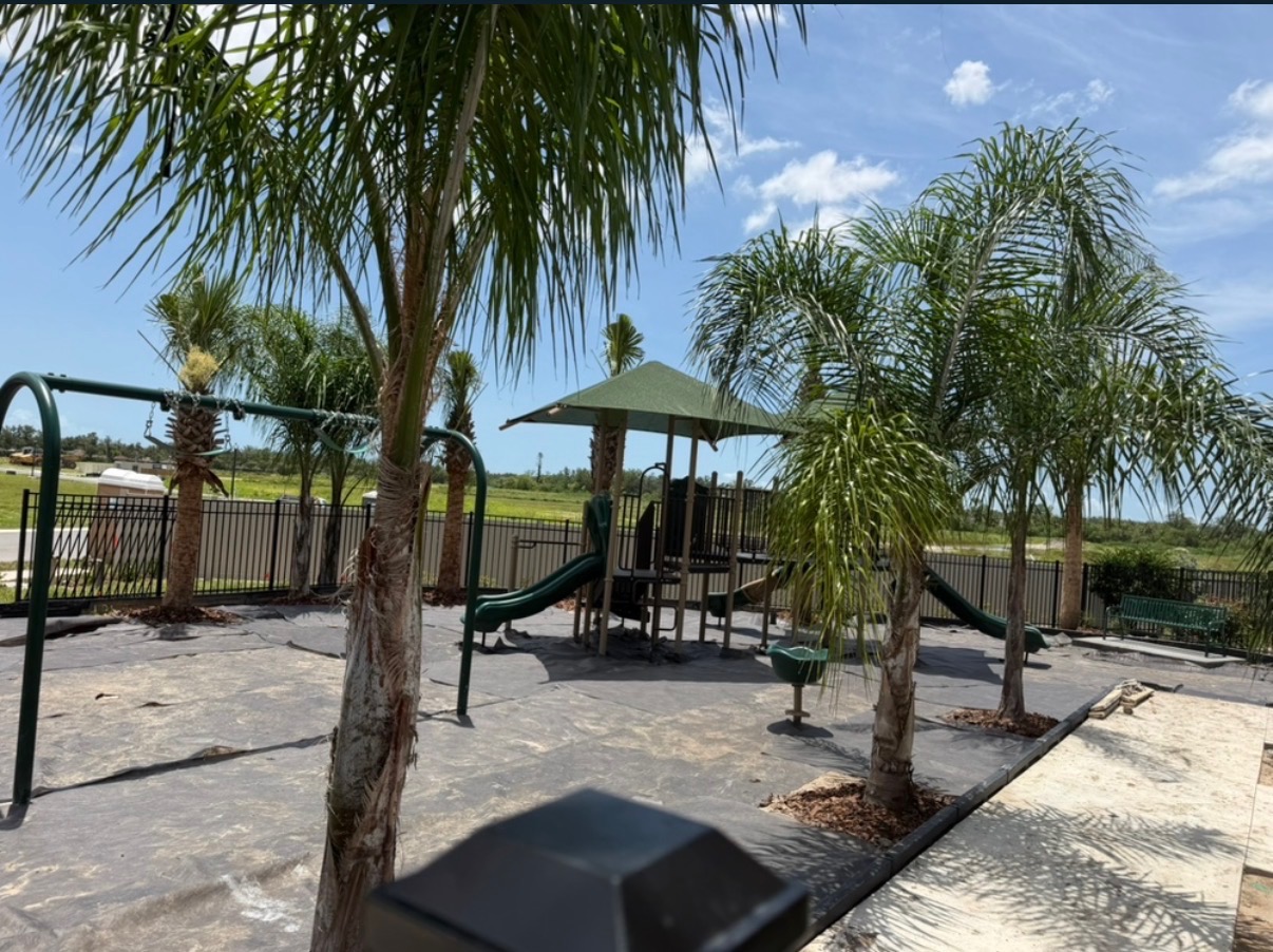 Outdoor play area under blue sky