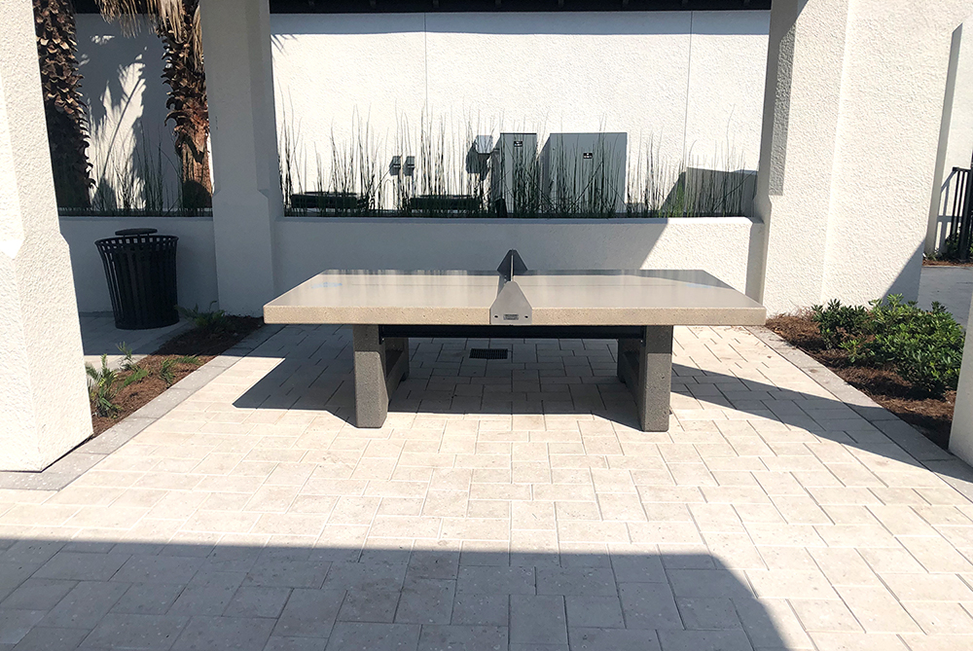 Modern ping pong table outside building
