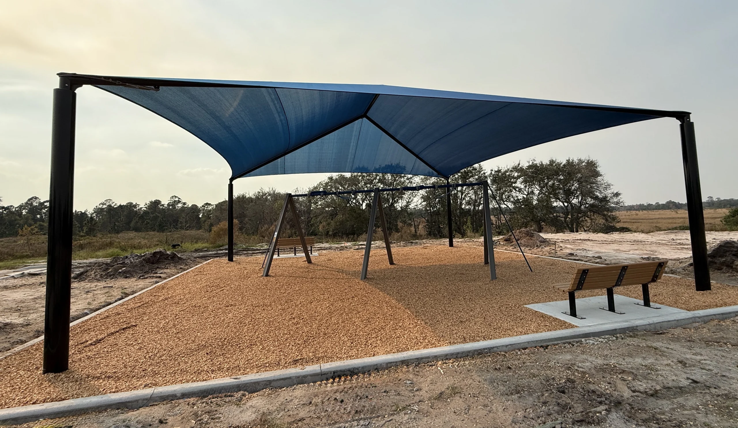 Playground with blue shade canopy